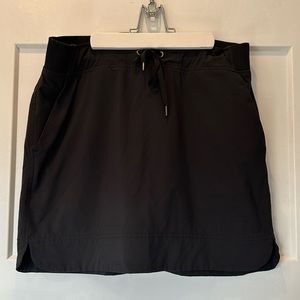 Athleta skirt with mesh shorts underneath!  Black, size 10.